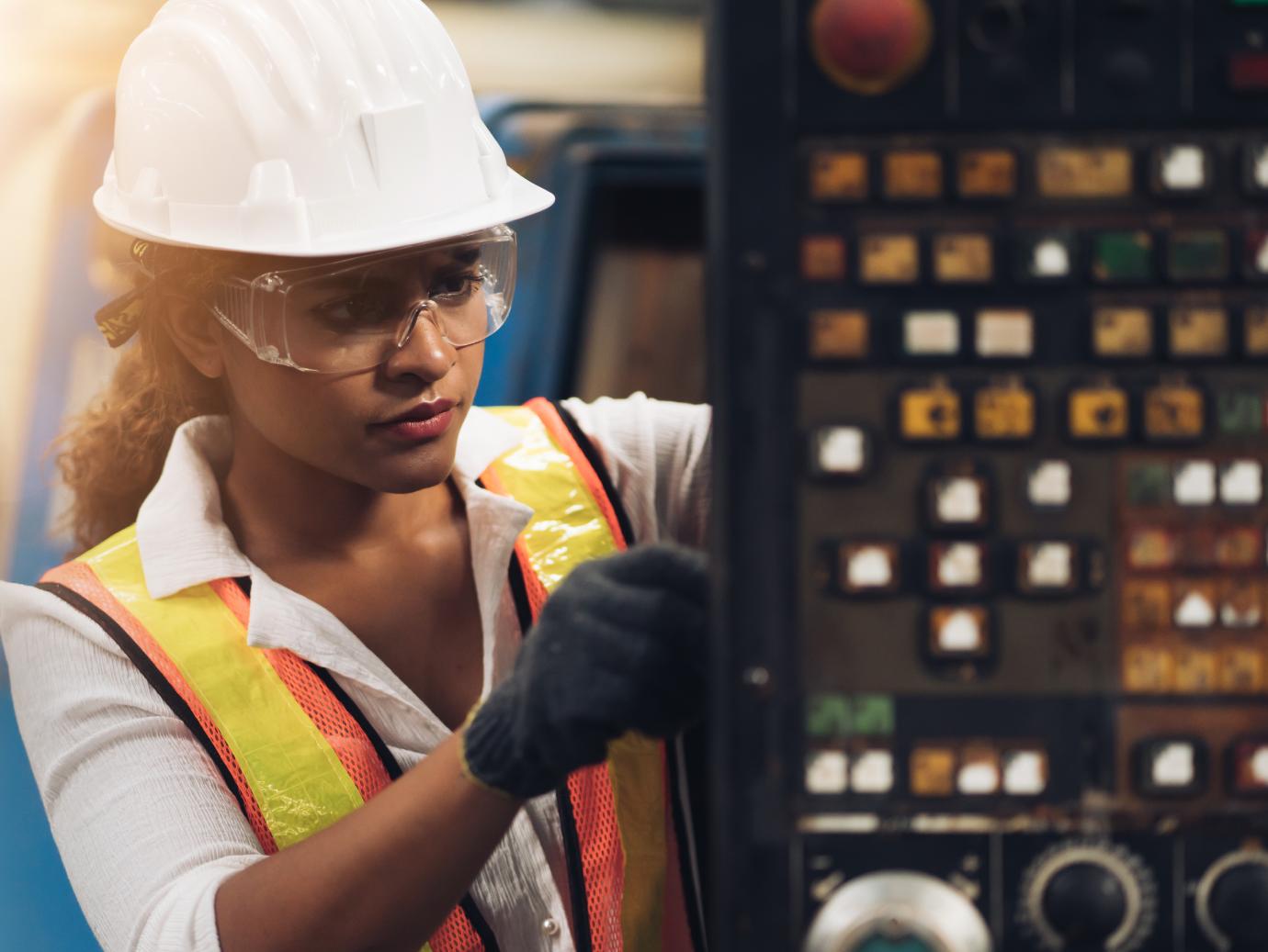 An engineer executing inspection and maintence of a machine