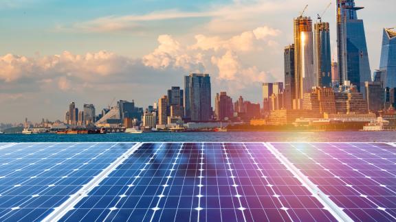 Urban energy optimization with solar panels set up in a city